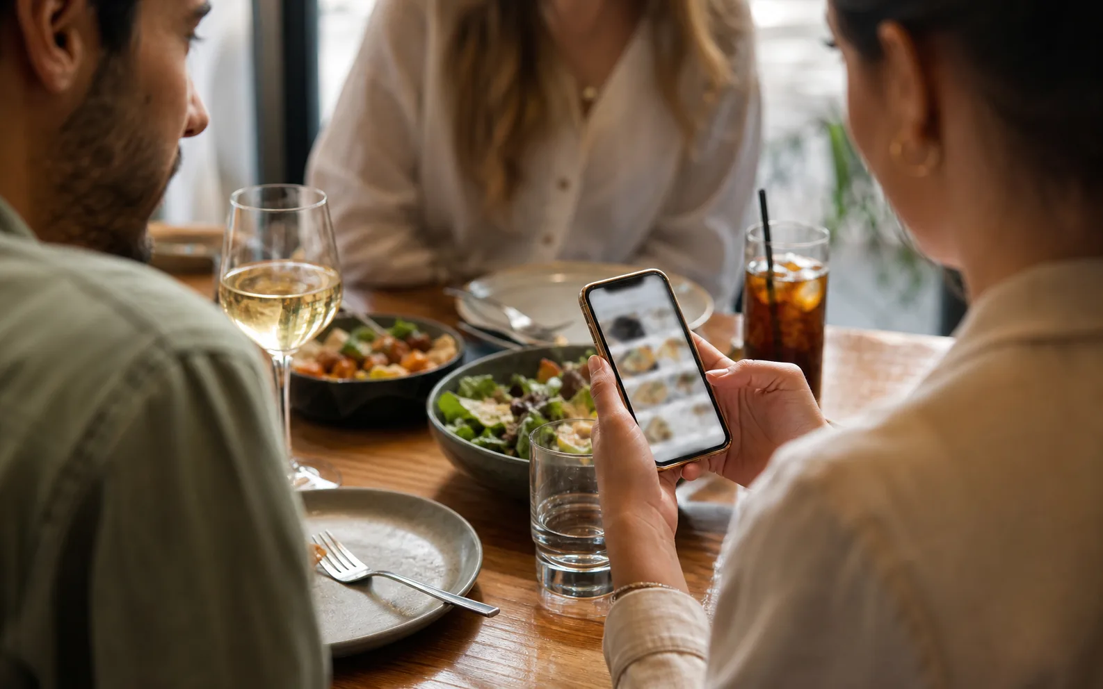 Restaurants guests browsing a phone menu